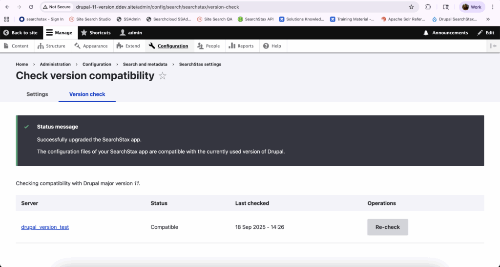Version check page shows successful SearchStax compatibility with Drupal 11, displaying green status message and server compatibility details.