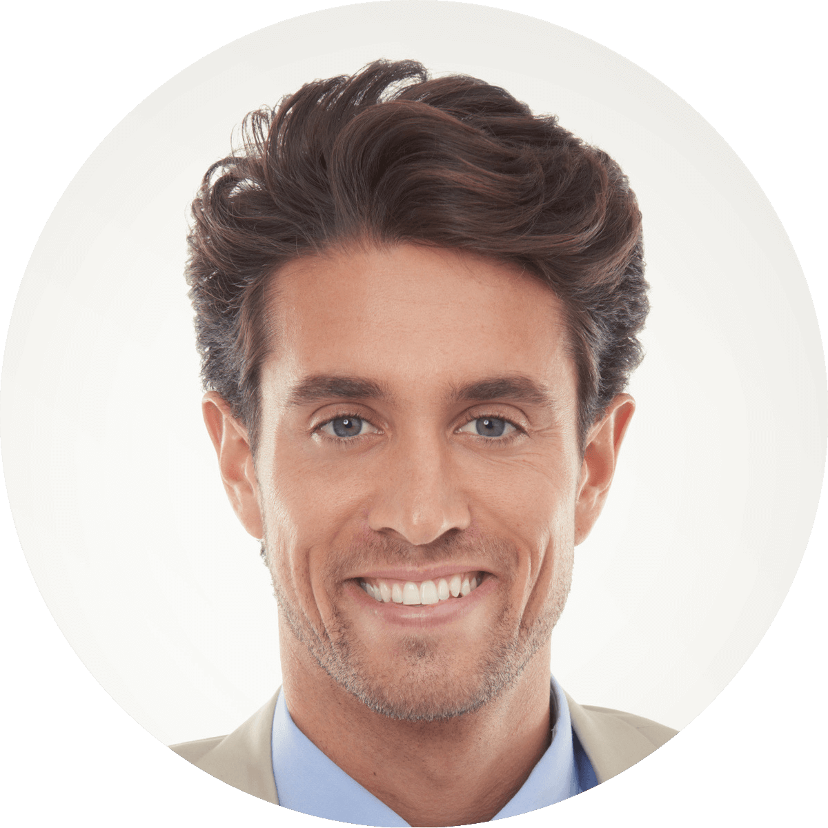 Professional headshot of a man in a light blue shirt against a neutral background.
