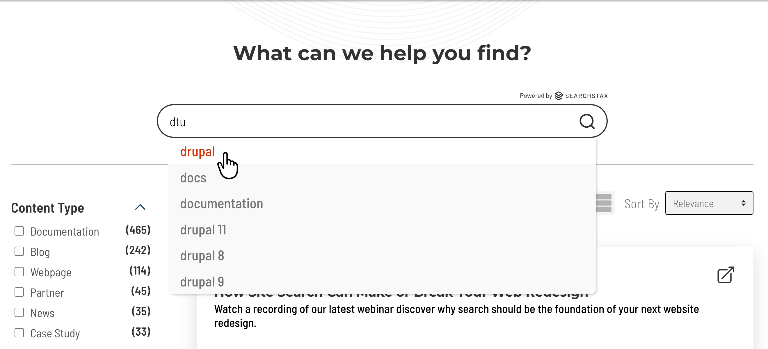 Cursor highlights 'drupal' suggestion in dropdown while typing “dru” in SearchStax Site Search search bar.