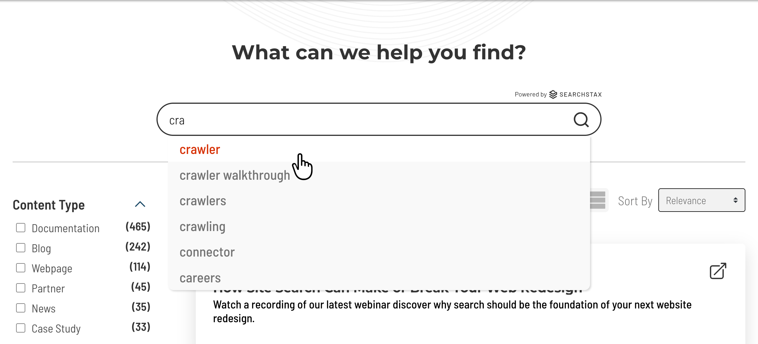 Cursor highlights 'crawler' suggestion in dropdown while typing “cra” in SearchStax Site Search search bar.