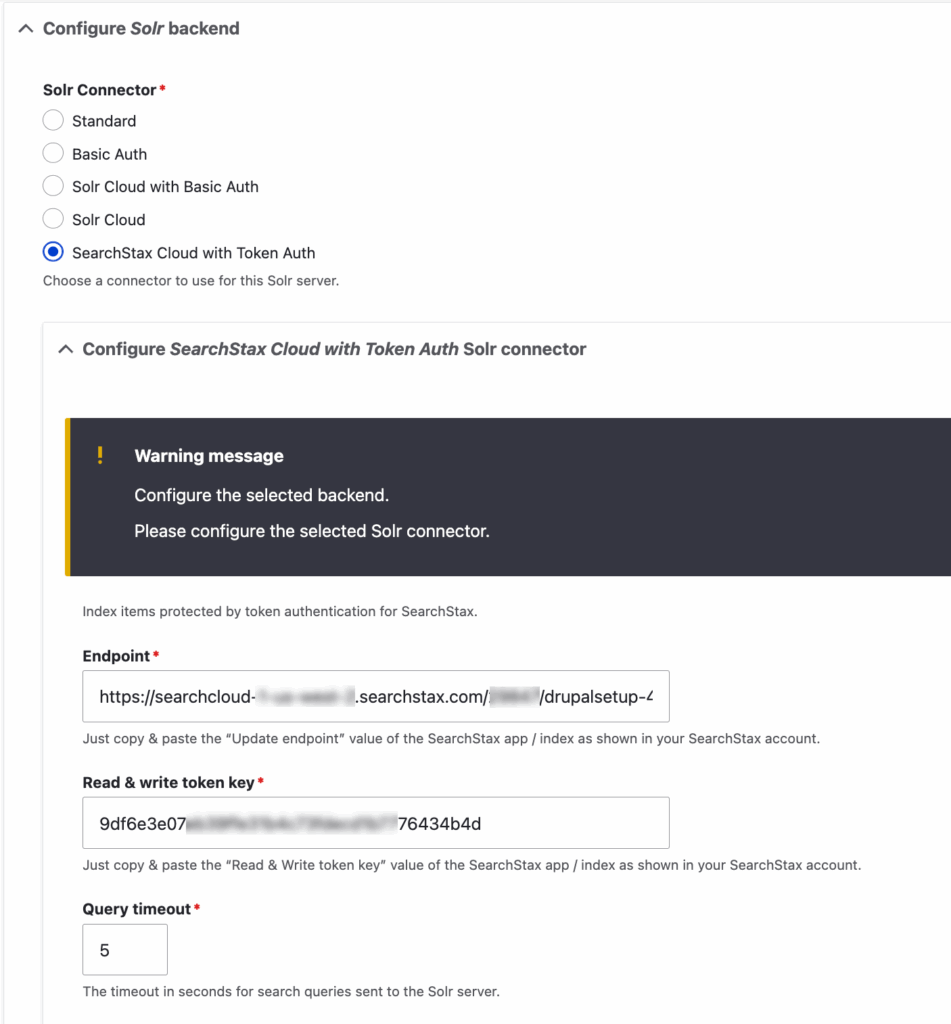 Configuration form for SearchStax Cloud with Token Auth Solr connector showing endpoint URL, token key field, and query timeout settings.